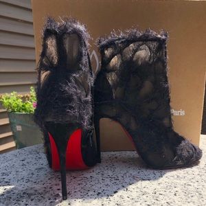 Unworn Christian Louboutin booties size 37 black.